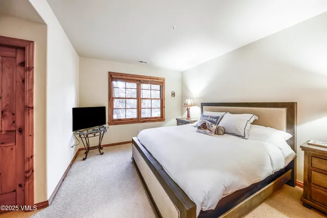 a kitchen with stainless steel appliances a stove sink and cabinets