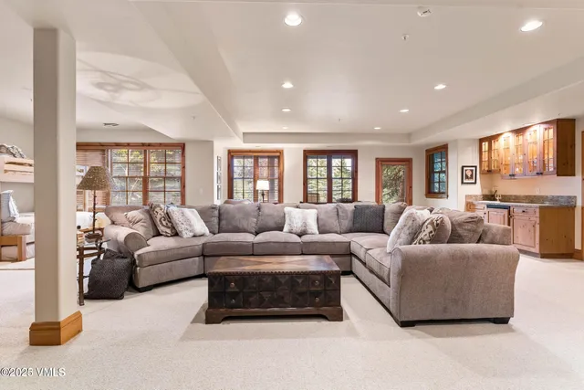 a view of a balcony with a table and chairs