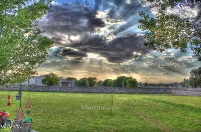 a view of a swimming pool with a patio