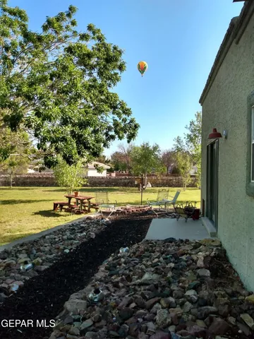 a view of swimming pool from a balcony
