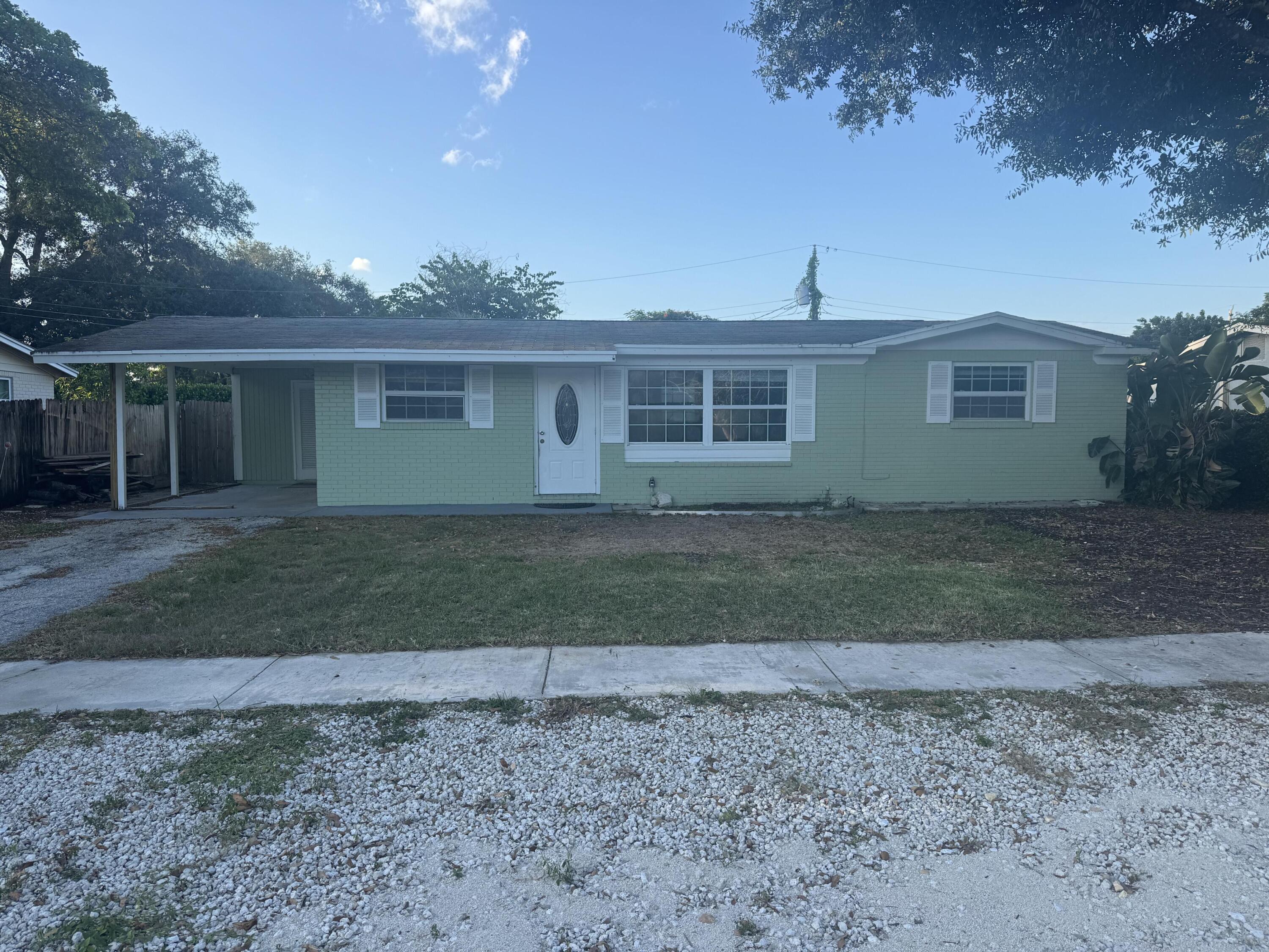 5807 Sullivan Road Jupiter, FL 33458 - Photo 2 of 12 02_beyc6a850adb35586