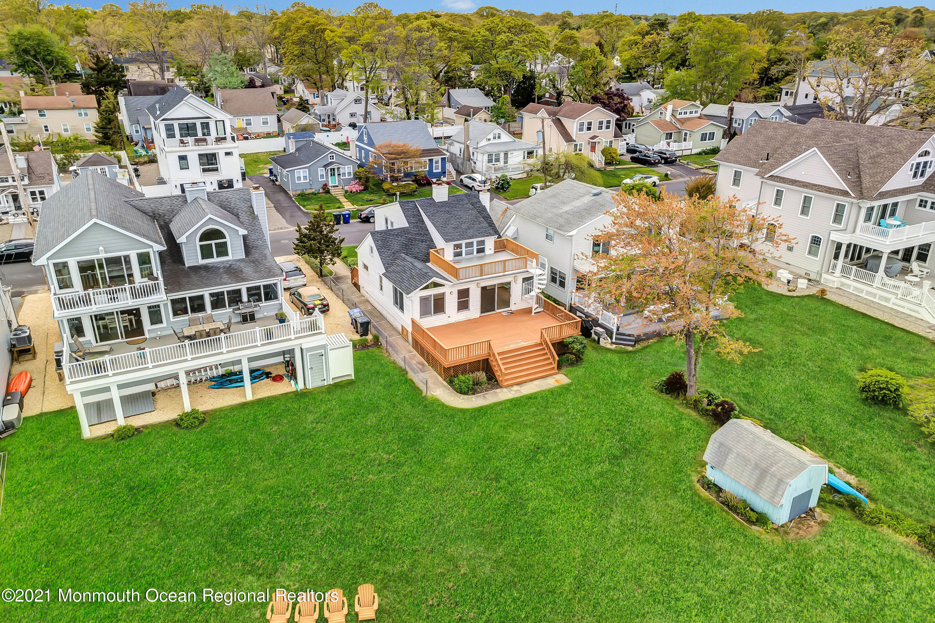 65 Metedeconk Road Brick, NJ 08723 - Photo 13 of 67 an aerial view of residential houses with outdoor space and trees