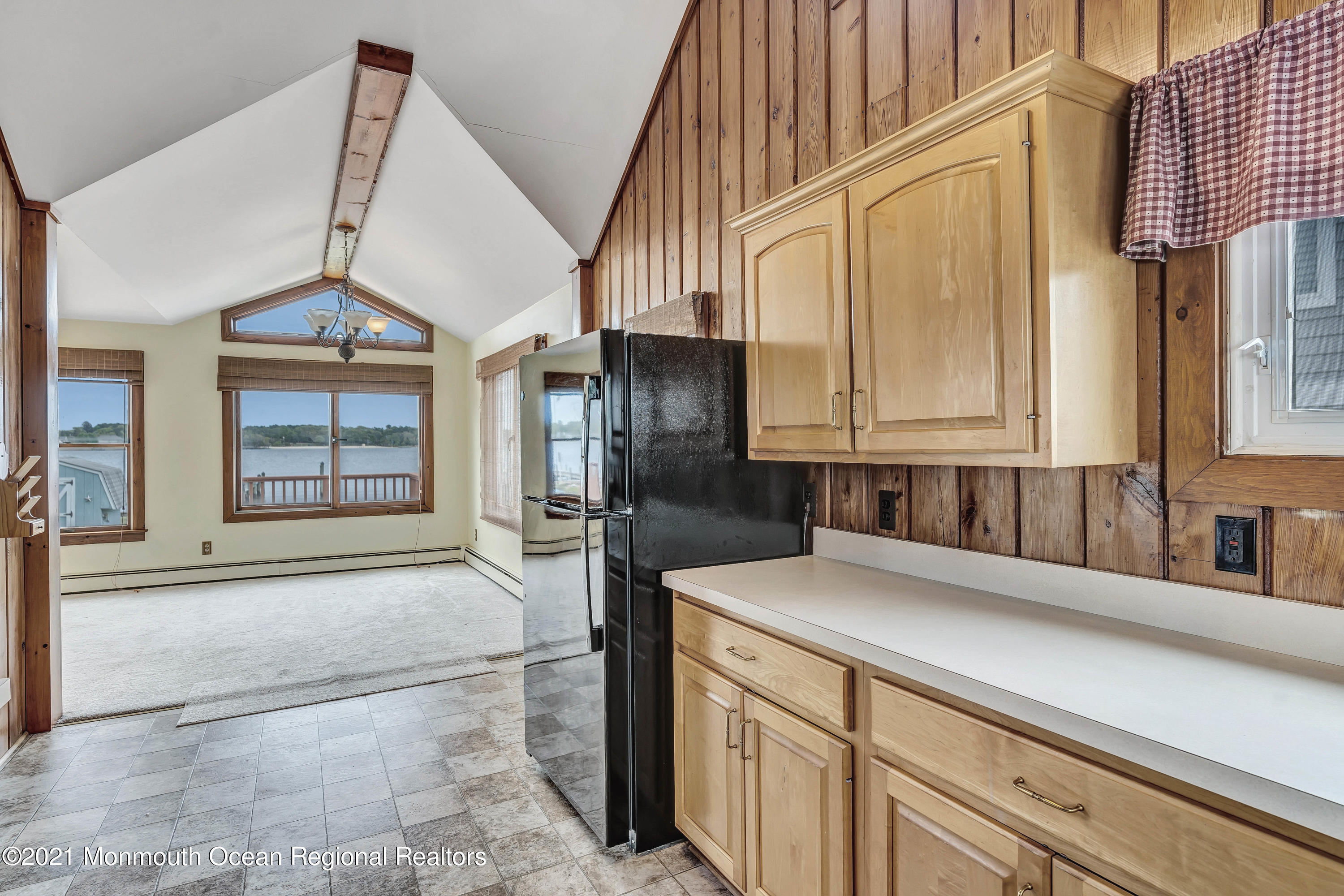 65 Metedeconk Road Brick, NJ 08723 - Photo 23 of 67 a kitchen with stainless steel appliances a sink and a refrigerator