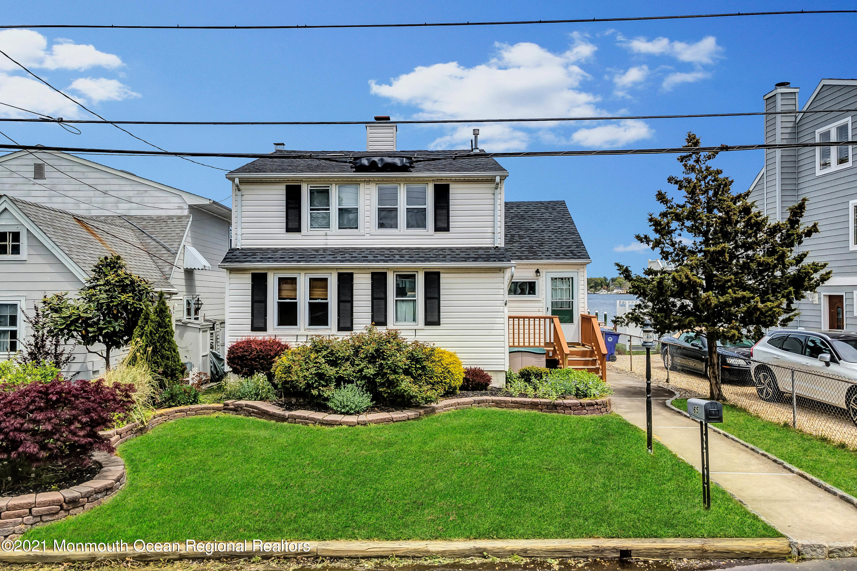 65 Metedeconk Road Brick, NJ 08723 - Photo 4 of 67 a front view of a house with garden