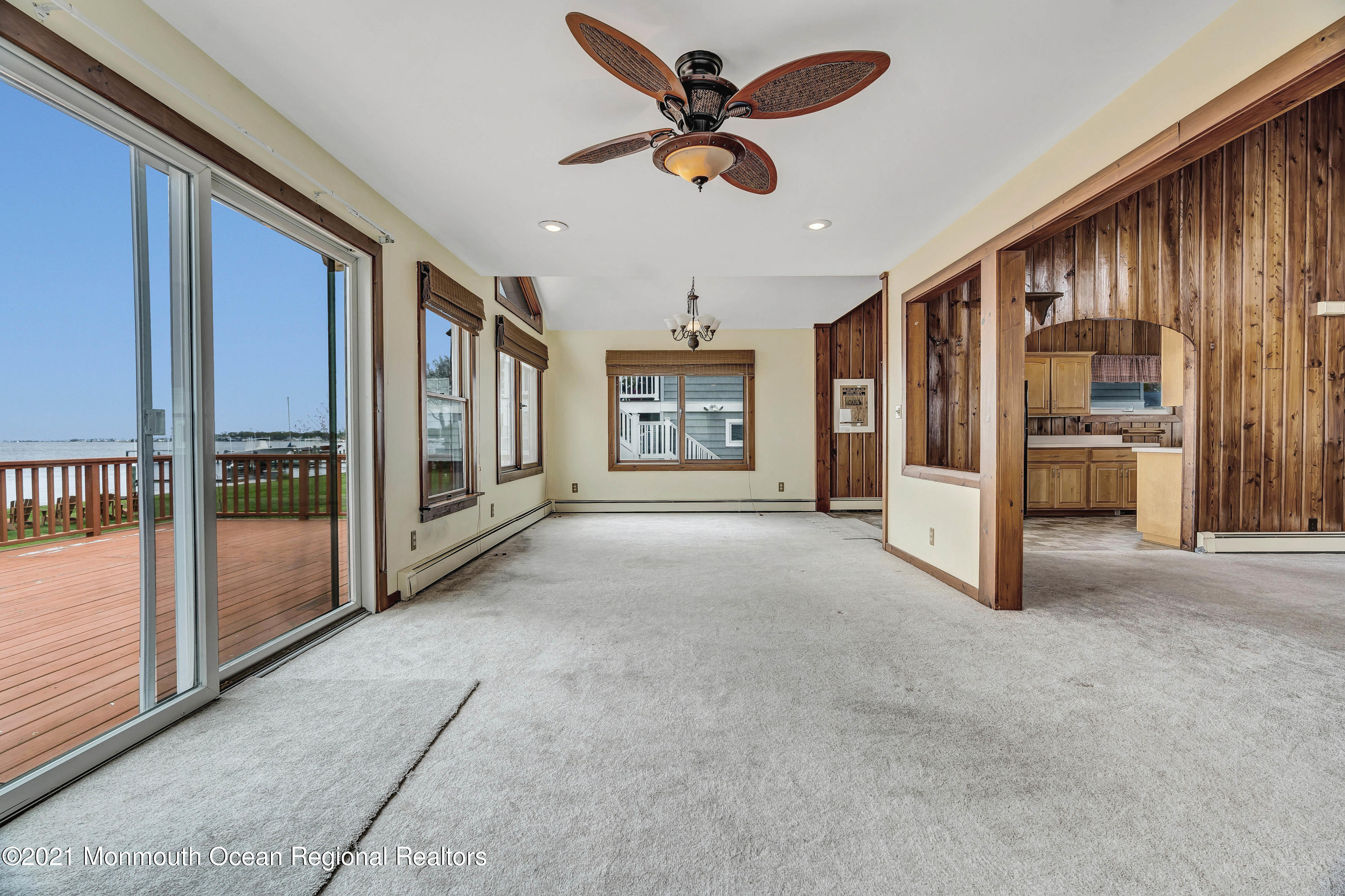 65 Metedeconk Road Brick, NJ 08723 - Photo 32 of 67 a view of a livingroom with a ceiling fan and window