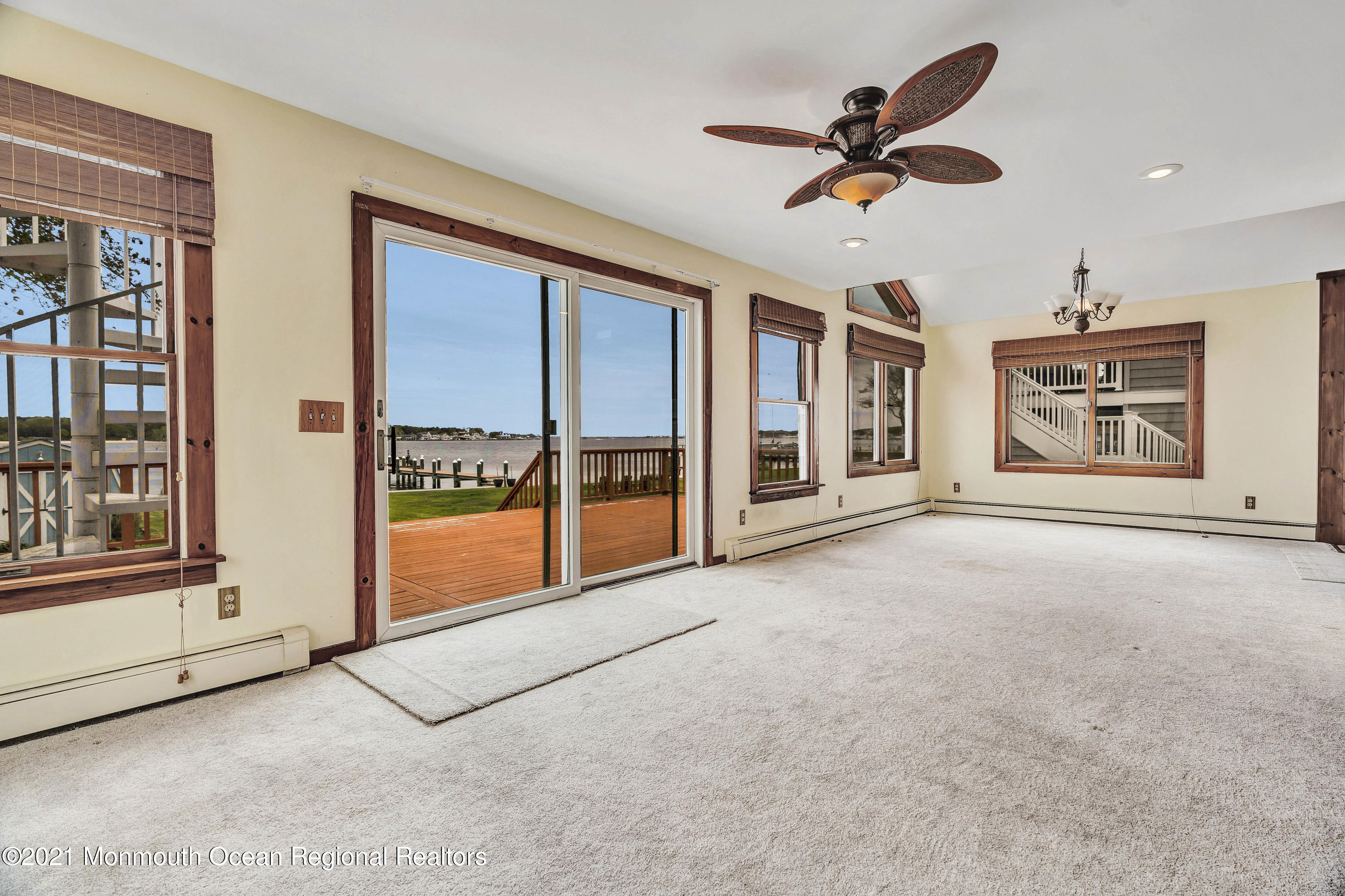 65 Metedeconk Road Brick, NJ 08723 - Photo 33 of 67 a view of livingroom with hardwood floor and ceiling fan