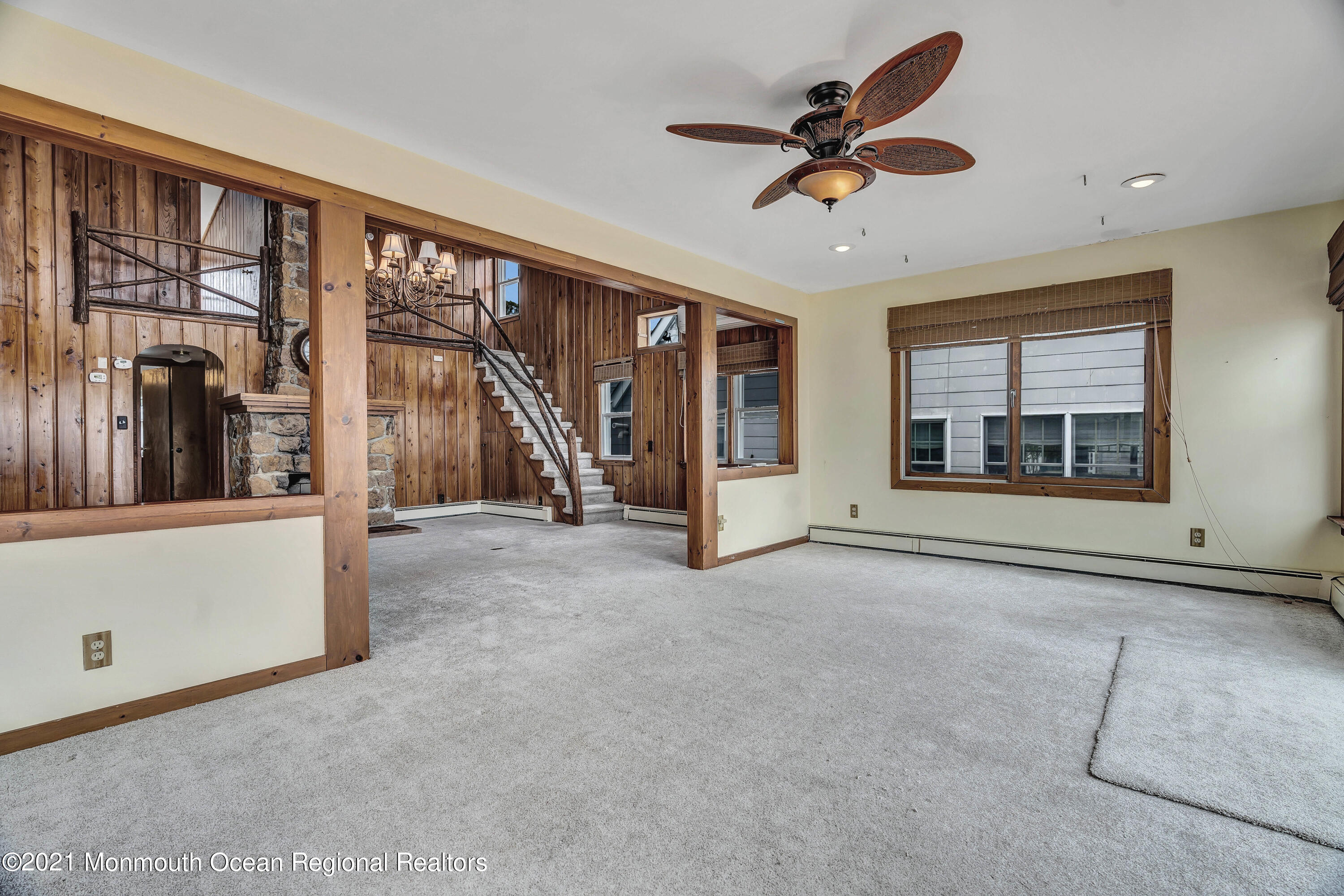 65 Metedeconk Road Brick, NJ 08723 - Photo 37 of 67 a view of an empty room with a fireplace and a large window