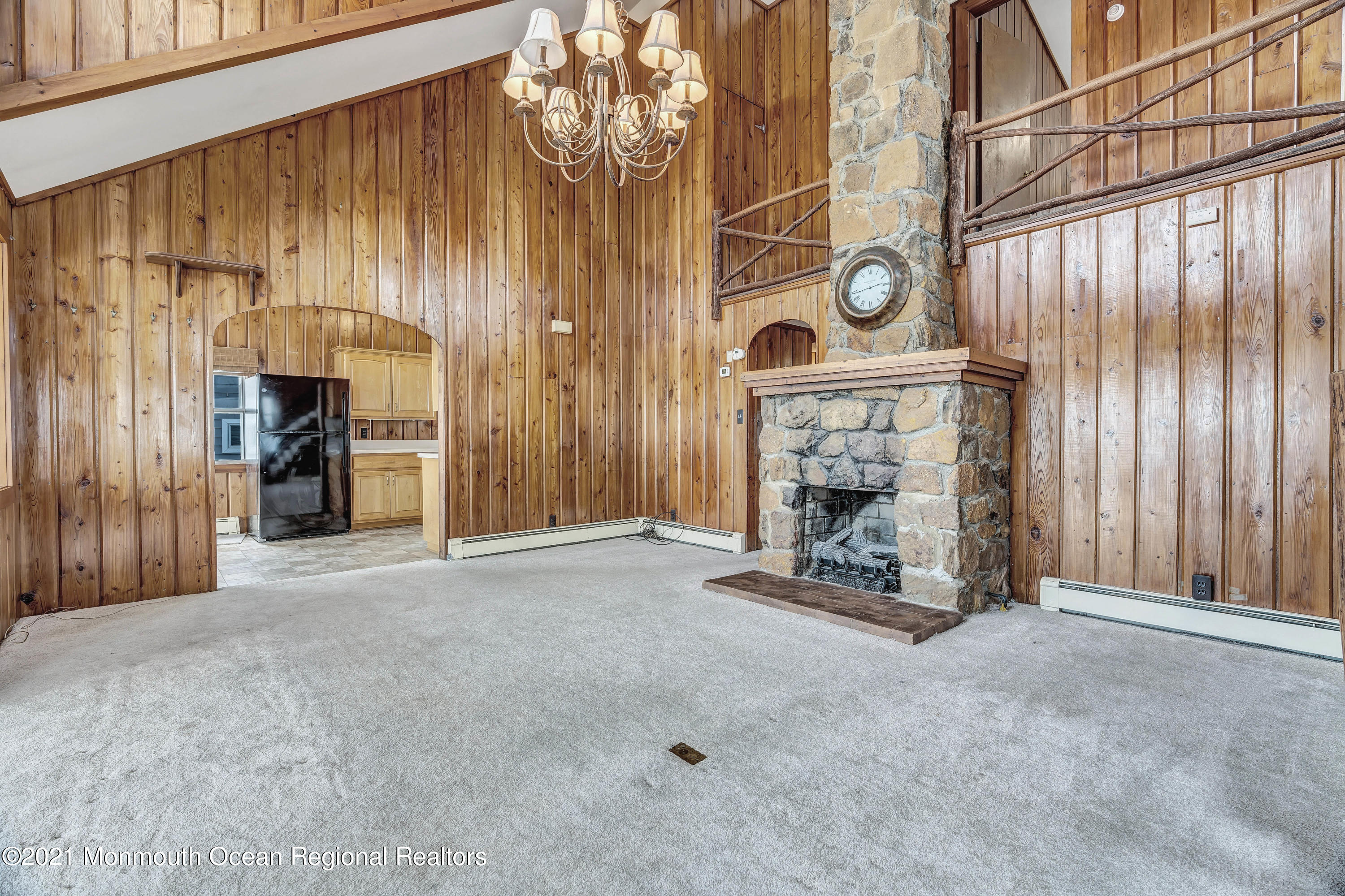 65 Metedeconk Road Brick, NJ 08723 - Photo 40 of 67 a view of a fireplace with an entryway door