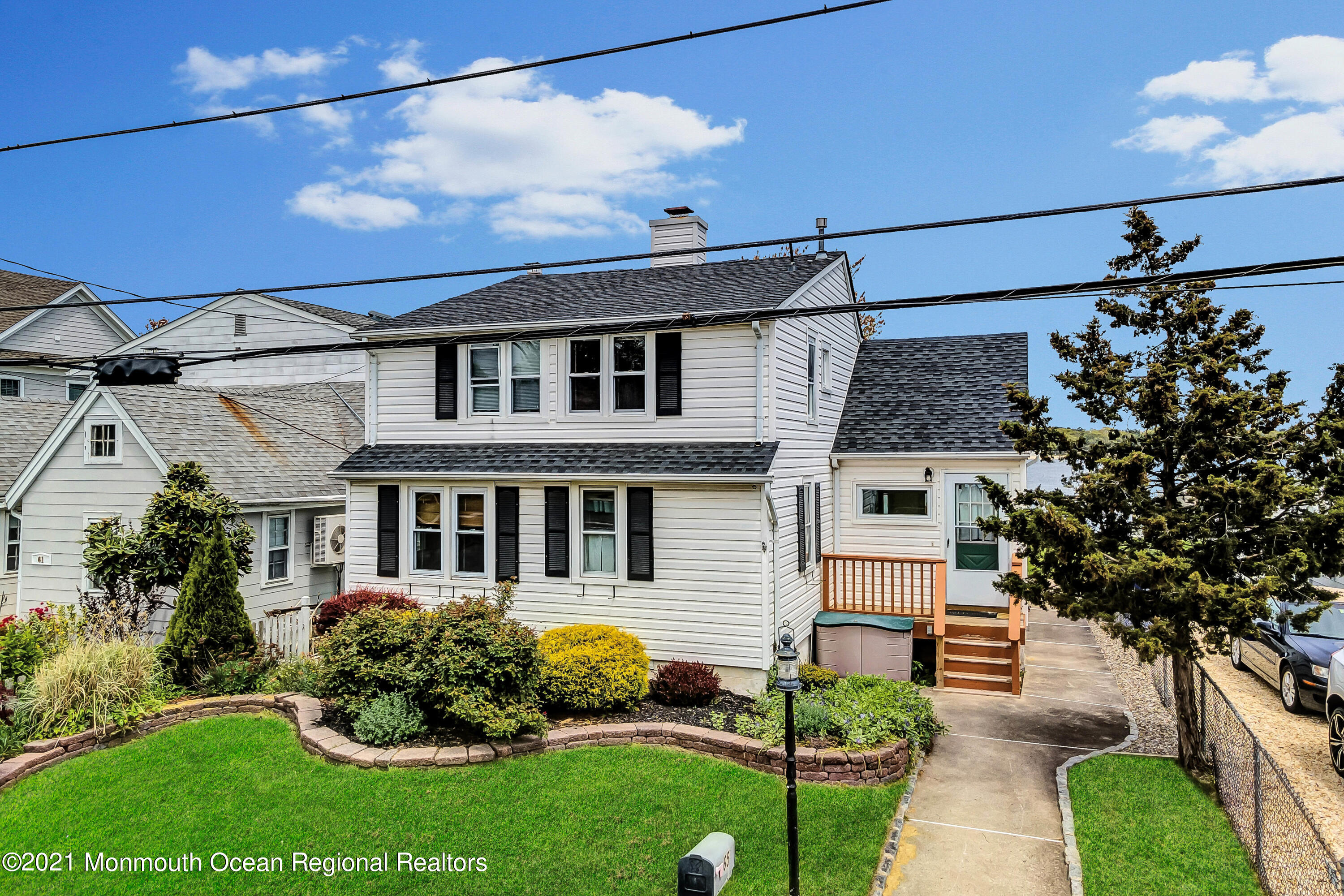 65 Metedeconk Road Brick, NJ 08723 - Photo 5 of 67 a front view of a house with garden