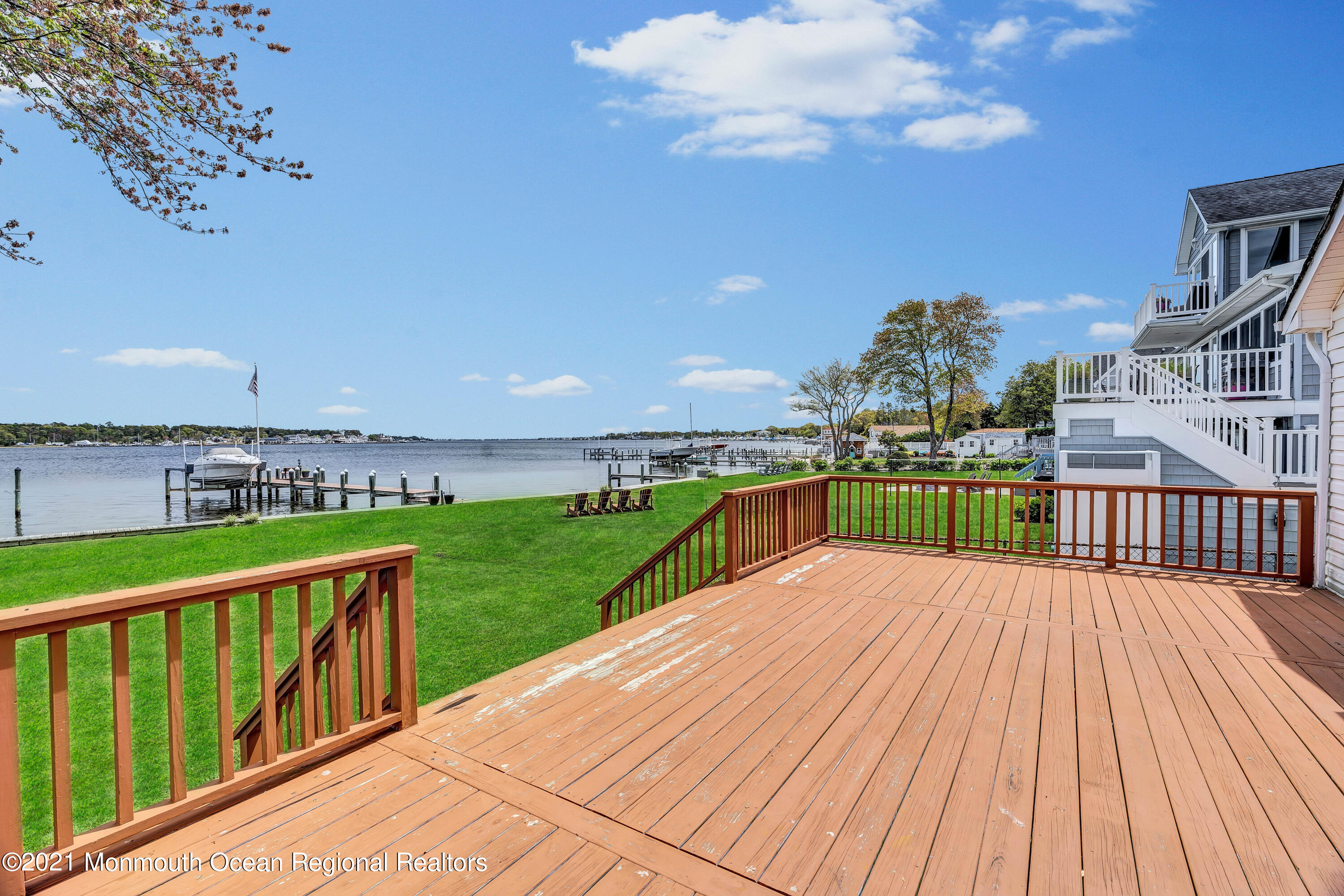 65 Metedeconk Road Brick, NJ 08723 - Photo 61 of 67 a view of a balcony with wooden floor and city view
