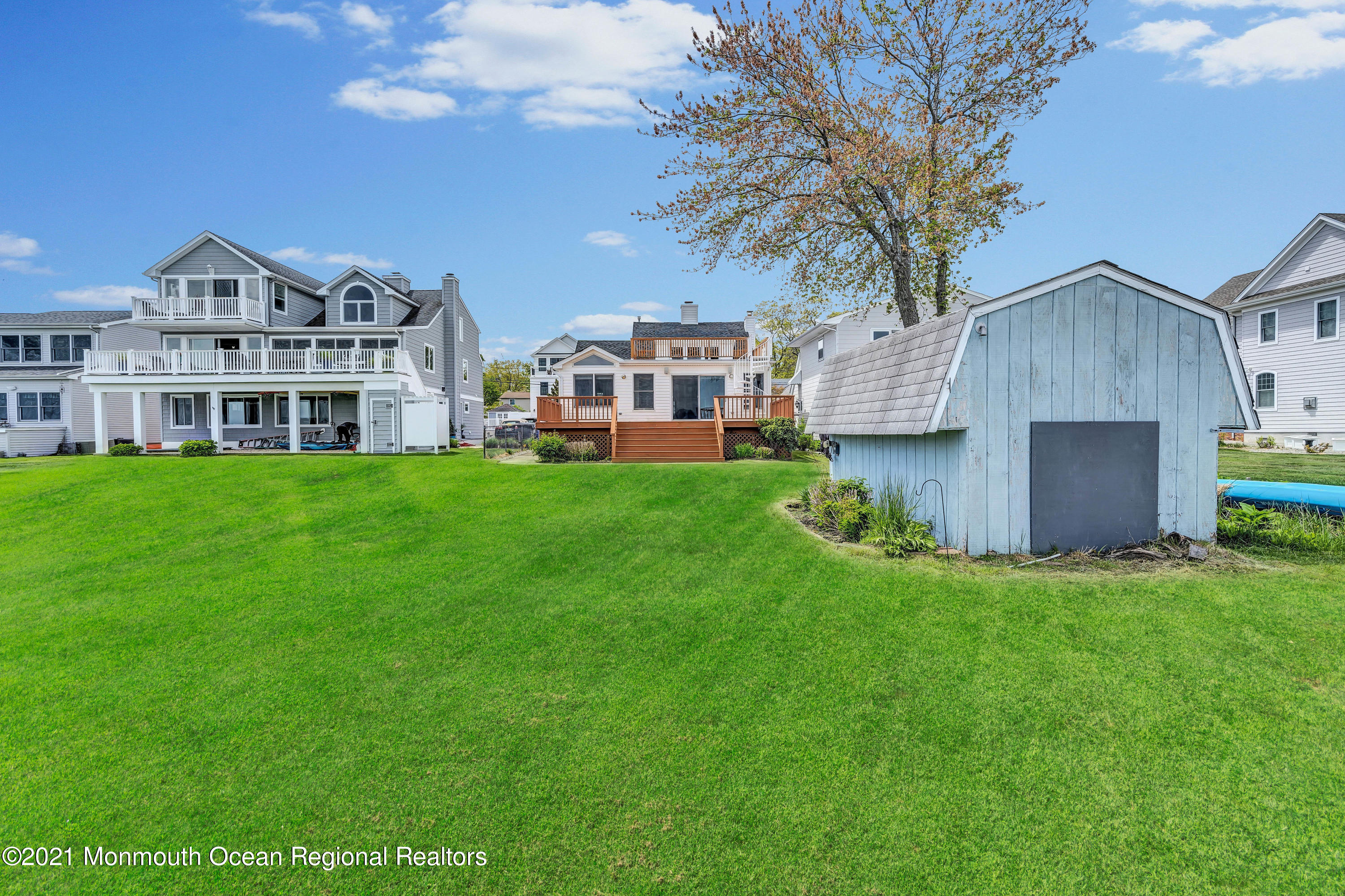65 Metedeconk Road Brick, NJ 08723 - Photo 65 of 67 a view of a house with a yard and sitting area