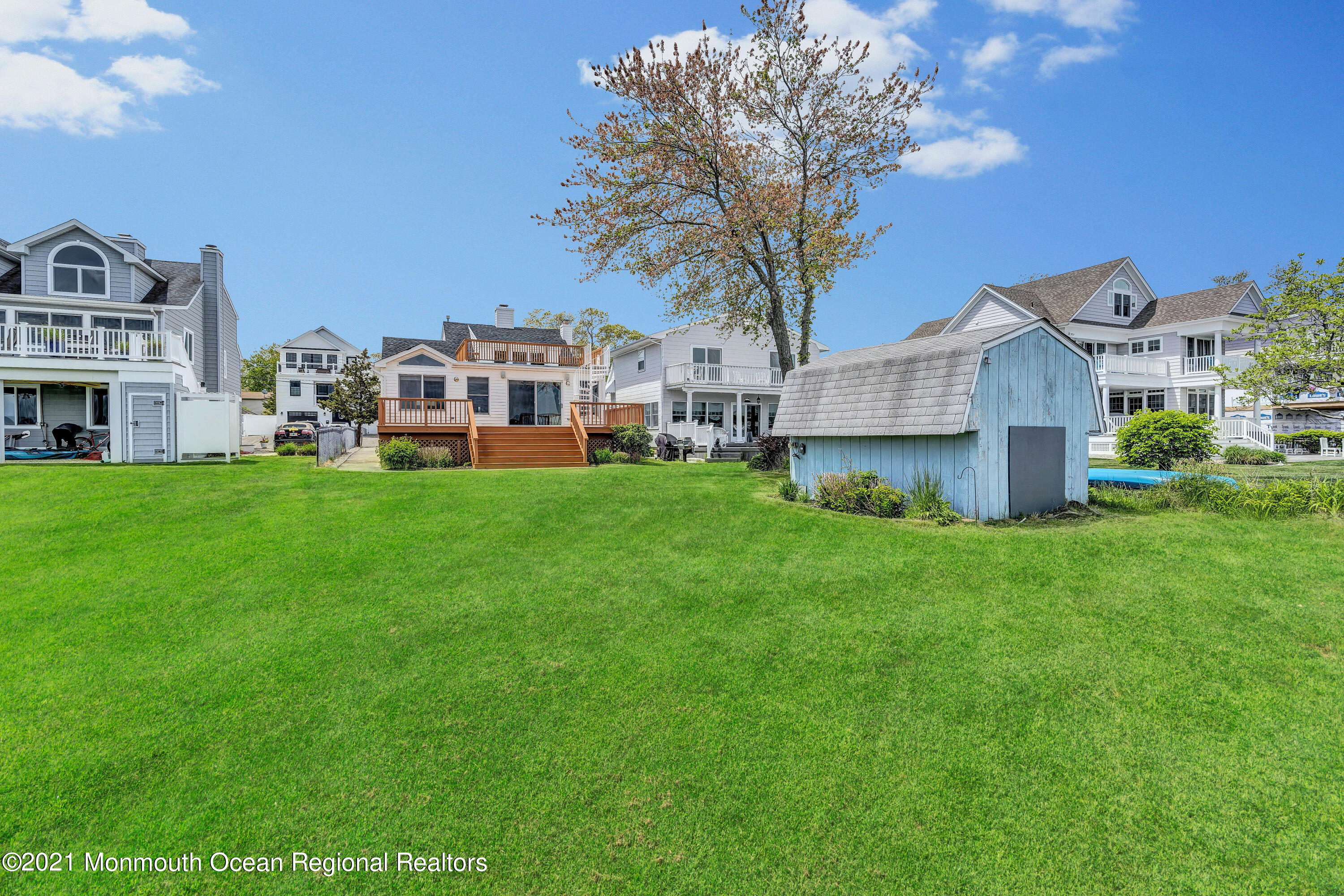 65 Metedeconk Road Brick, NJ 08723 - Photo 66 of 67 a view of a house with a yard