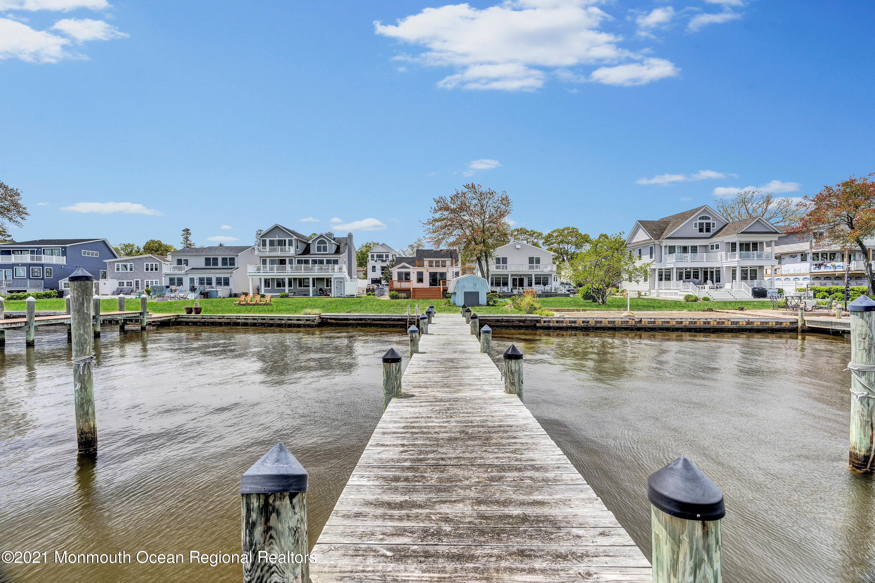 65 Metedeconk Road Brick, NJ 08723 - Photo 67 of 67 a view of a lake with a city
