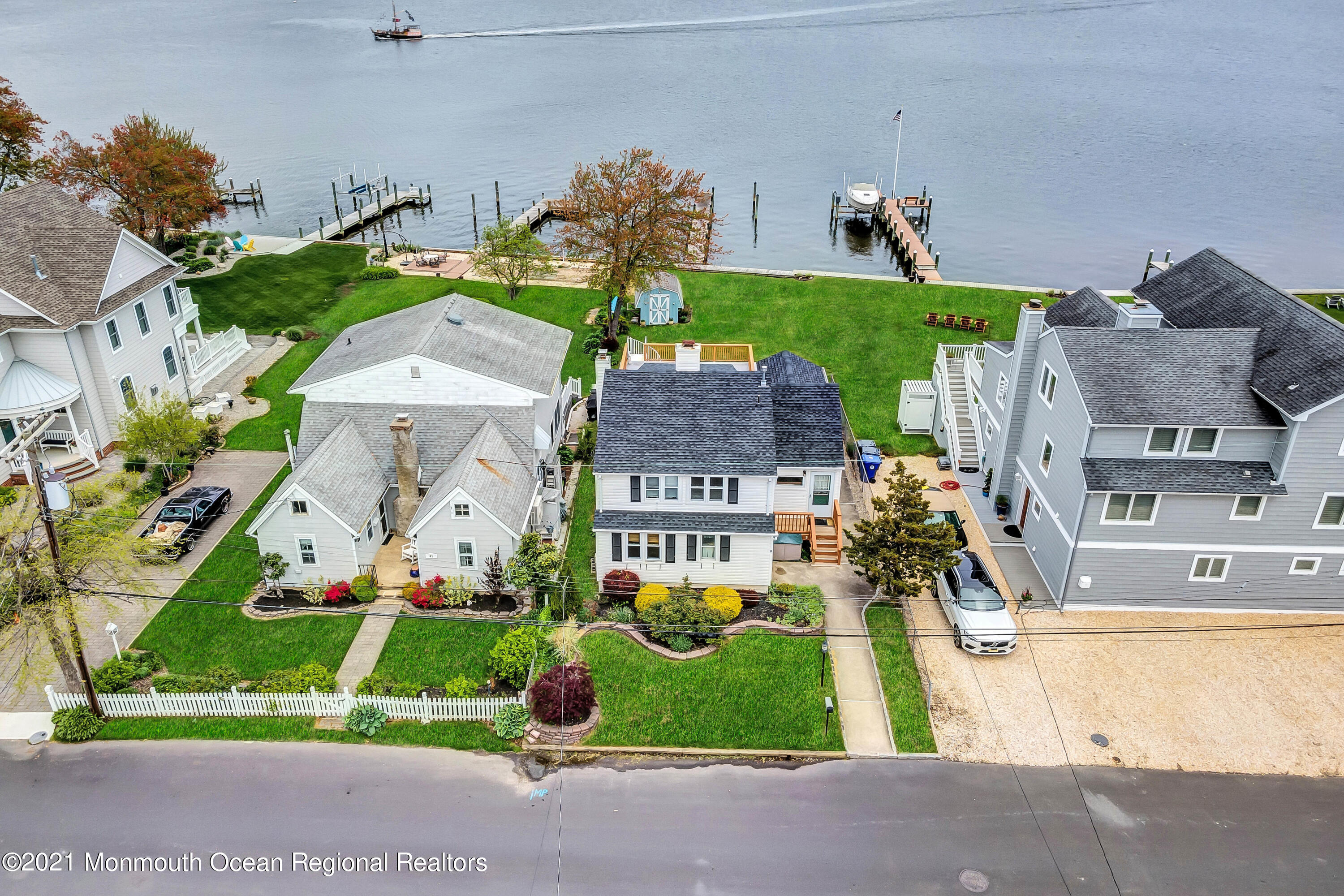 65 Metedeconk Road Brick, NJ 08723 - Photo 8 of 67 an aerial view of a house with a garden and plants