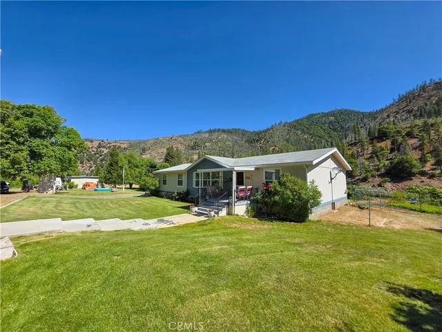 a kitchen with a sink cabinets and window