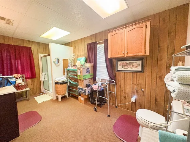 a utility room with dryer washer and a sink