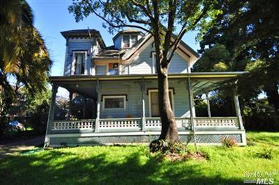 1232 Irwin Street, Unit 6 San Rafael, CA 94901 - Photo 1 of 1 a front view of a house with a garden