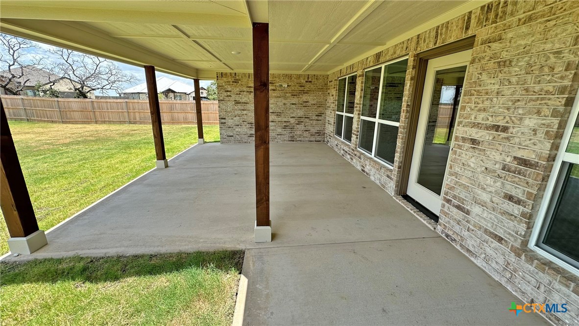 115 Overlook Trail Copperas Cove, TX 76522 - Photo 34 of 34 a view of an empty room with floor to ceiling windows with wooden floor