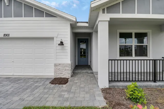 a view of entrance gate of a house