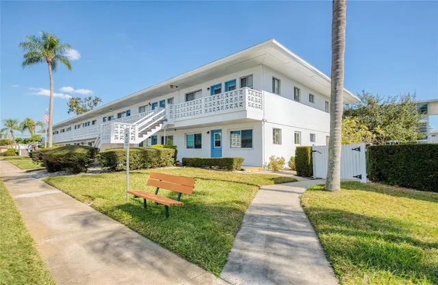 a front view of a house with swimming pool
