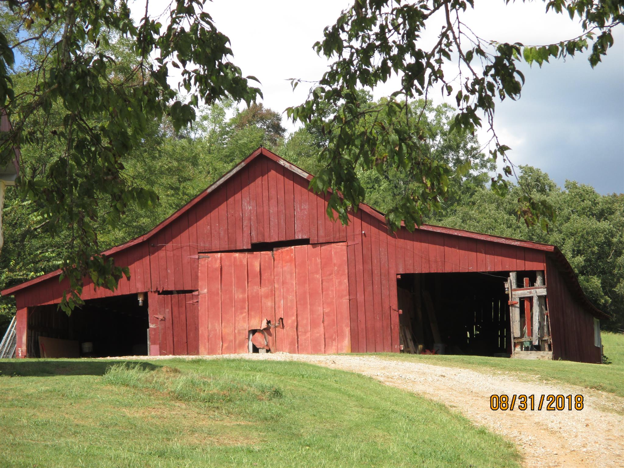 1119 Mitchell Road Pulaski, TN 38478 - Photo 3 of 29 a view of front of a house with a yard