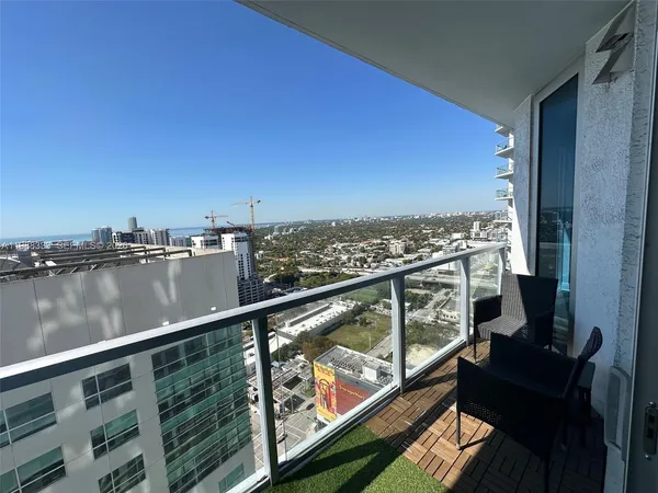 a view of city from a balcony