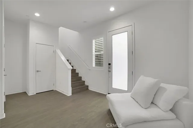 a kitchen with stainless steel appliances a refrigerator stove and sink