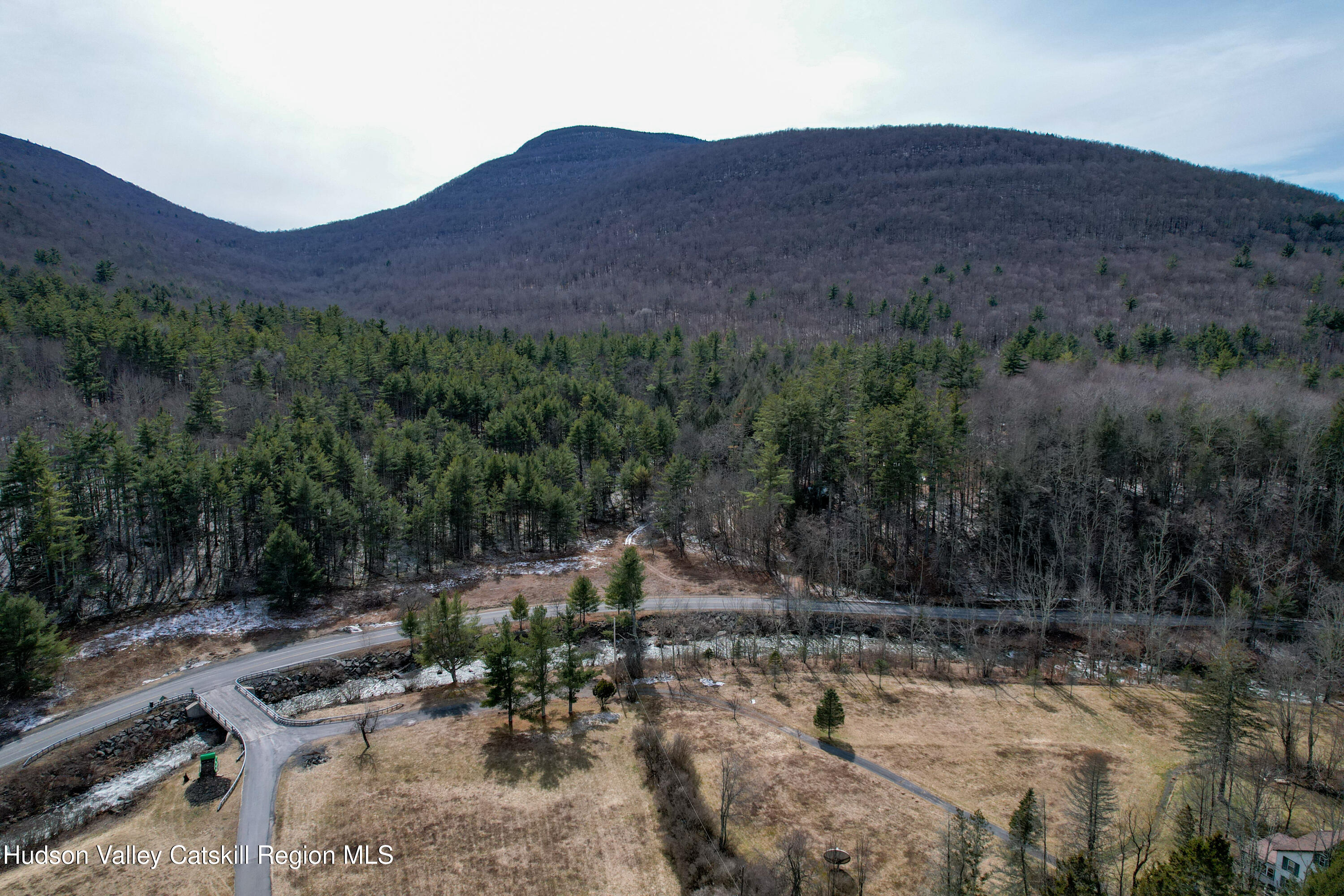 Tbd Spruceton Road West Kill, NY 12492 - Photo 3 of 15 a view of a lush green hillside and a building