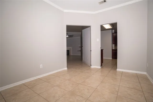 an empty room with a bathroom