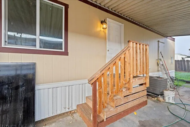a view of entryway with wooden floor