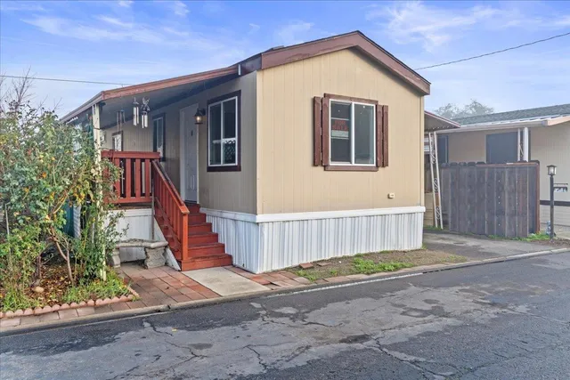 a front view of a house with a garage