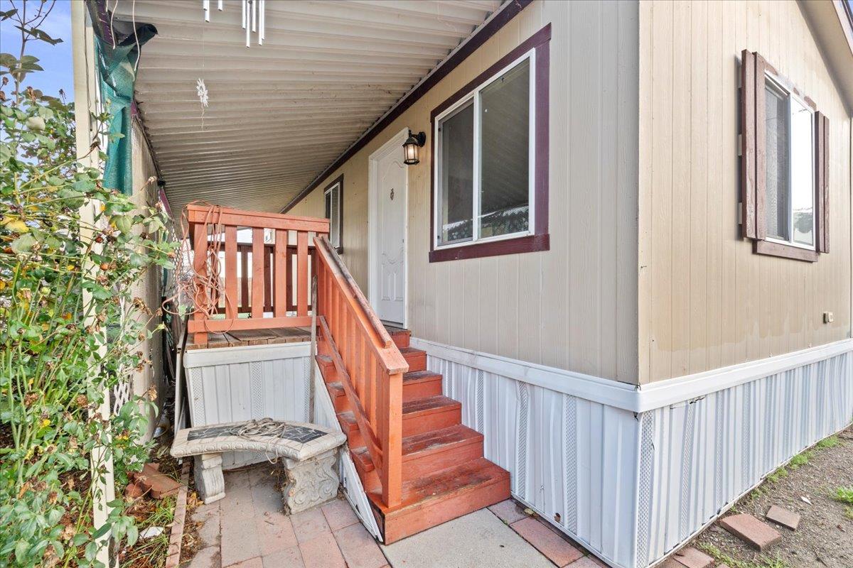 1249 Magic Sands Way Turlock, CA 95380 - Photo 6 of 13 a view of entryway and hall with wooden floor