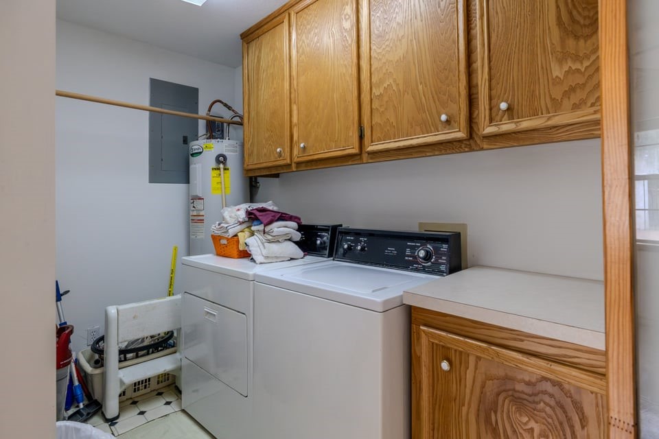 483 Riverside Drive Palacios, TX 77465 - Photo 30 of 41 a utility room with dryer and washer