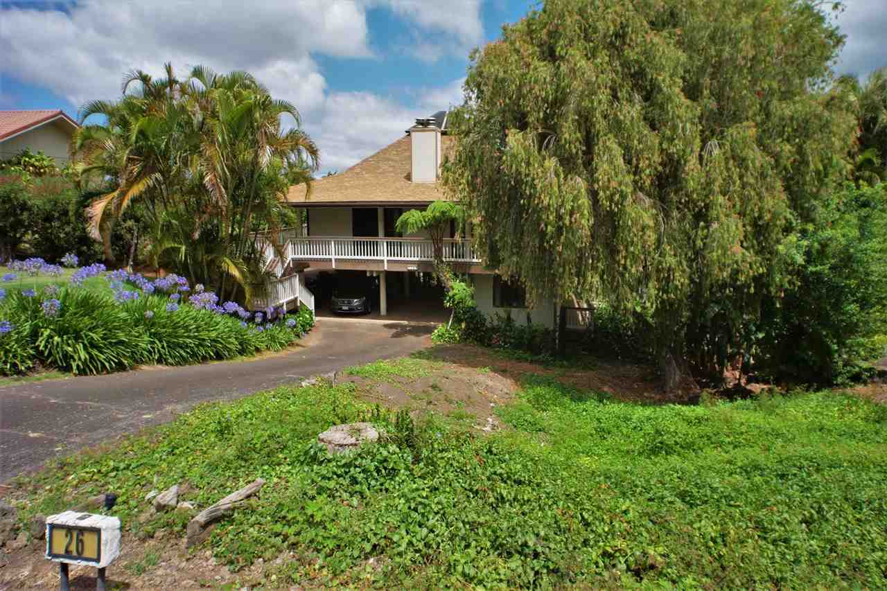26 Manu Street Kula, HI 96790 - Photo 1 of 30 a front view of a house with a yard and trees