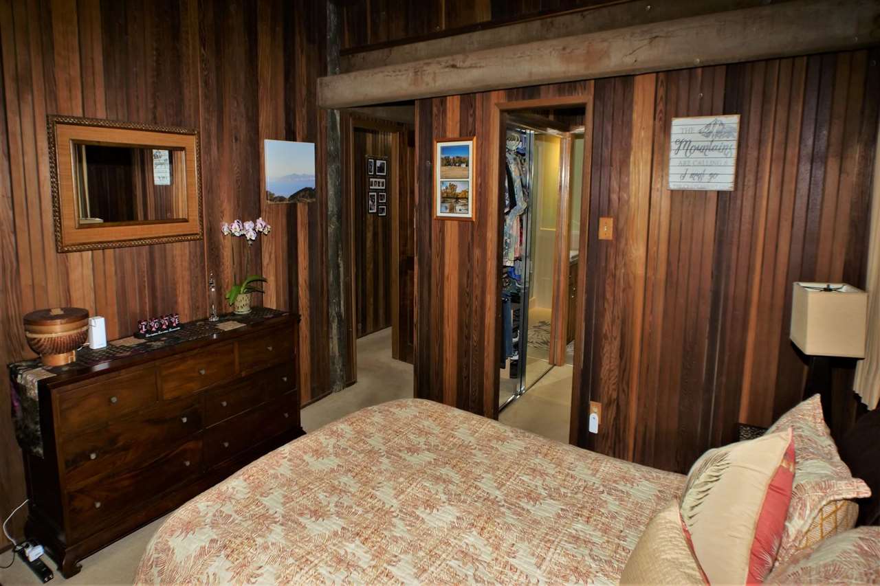 26 Manu Street Kula, HI 96790 - Photo 14 of 30 a bedroom with a bed and a dresser