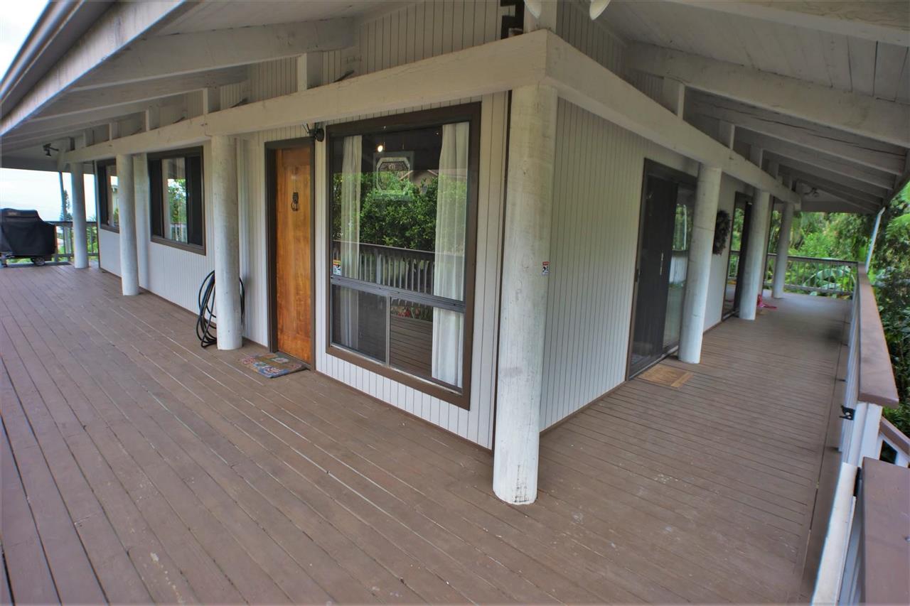 26 Manu Street Kula, HI 96790 - Photo 25 of 30 a view of a porch floor to ceiling window and wooden floor