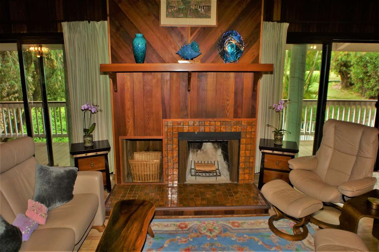 26 Manu Street Kula, HI 96790 - Photo 4 of 30 a living room with furniture and a fireplace