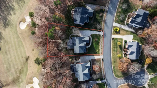 a bathroom with a sink toilet and a mirror