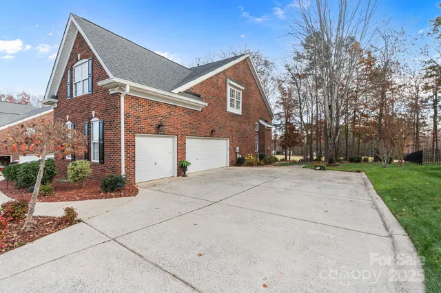 a view of a house with a backyard porch and sitting area