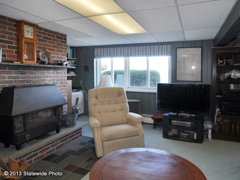 385 Puncatest Neck Road Tiverton, RI 02878 - Photo 5 of 25 Den/Family/Great Room.