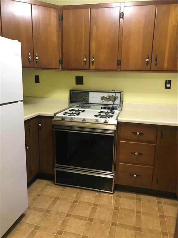 760 East Pike Road Indiana, PA 15701 - Photo 8 of 24 Kitchen includes Gas Stove and Refrigerator