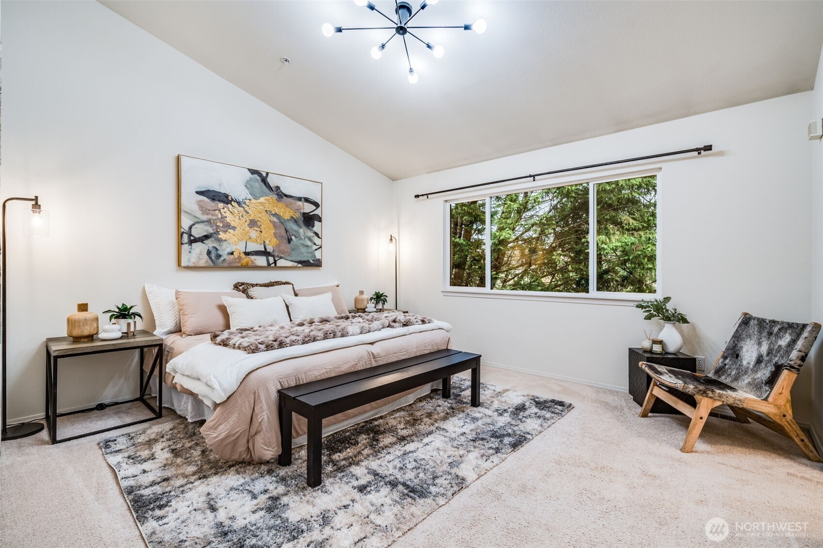 14503 Simonds Road Northeast, Unit C Kirkland, WA 98034 - Photo 18 of 29 a bedroom with a bed and a window