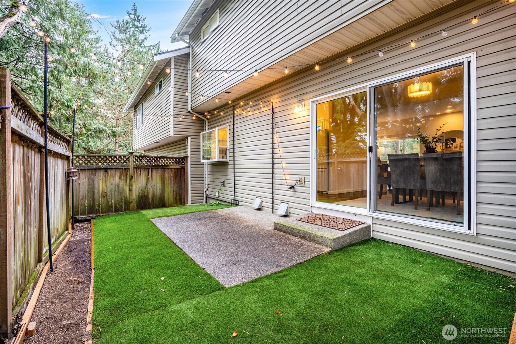 14503 Simonds Road Northeast, Unit C Kirkland, WA 98034 - Photo 26 of 29 a view of back yard of the house