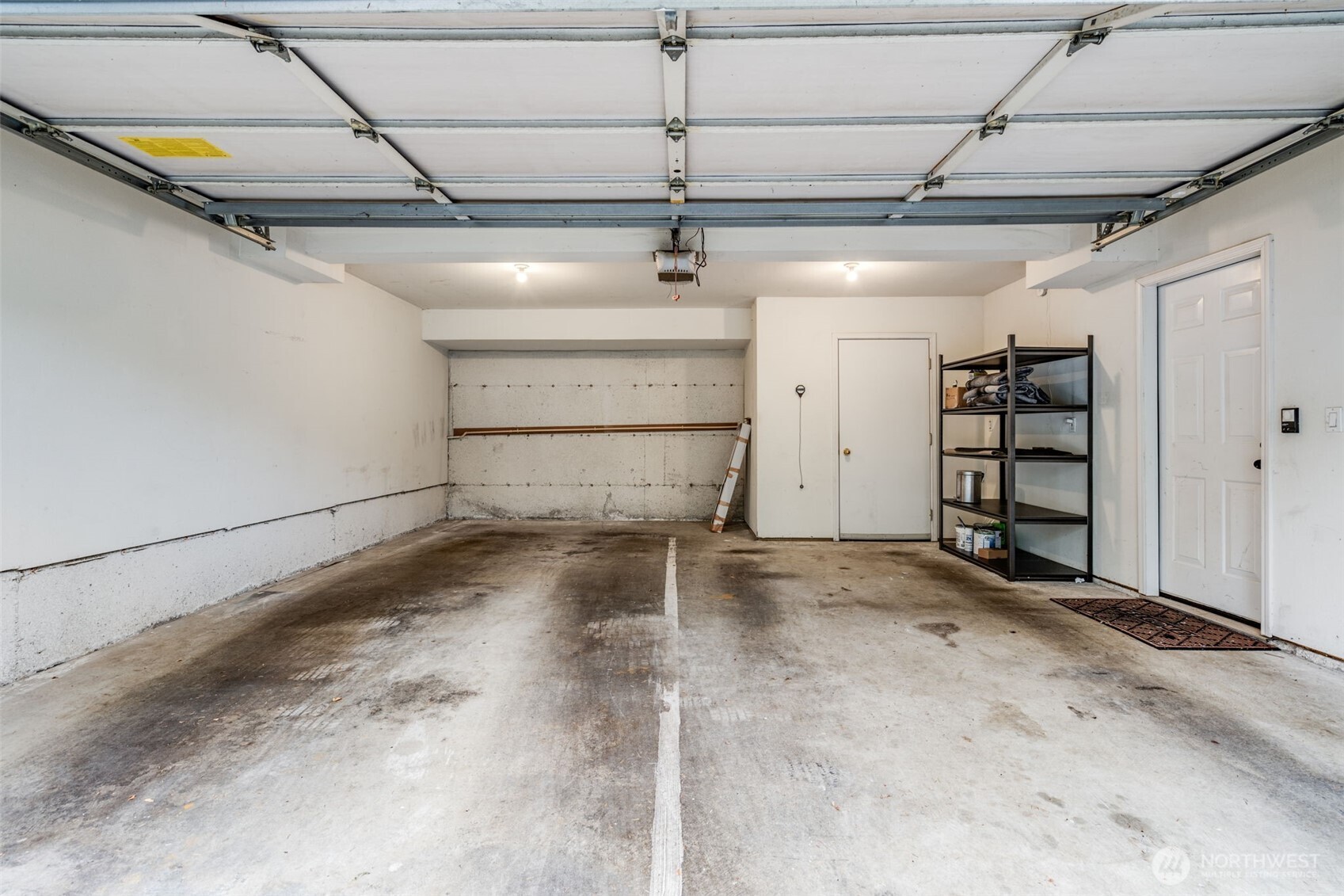 14503 Simonds Road Northeast, Unit C Kirkland, WA 98034 - Photo 29 of 29 a view of a room with storage