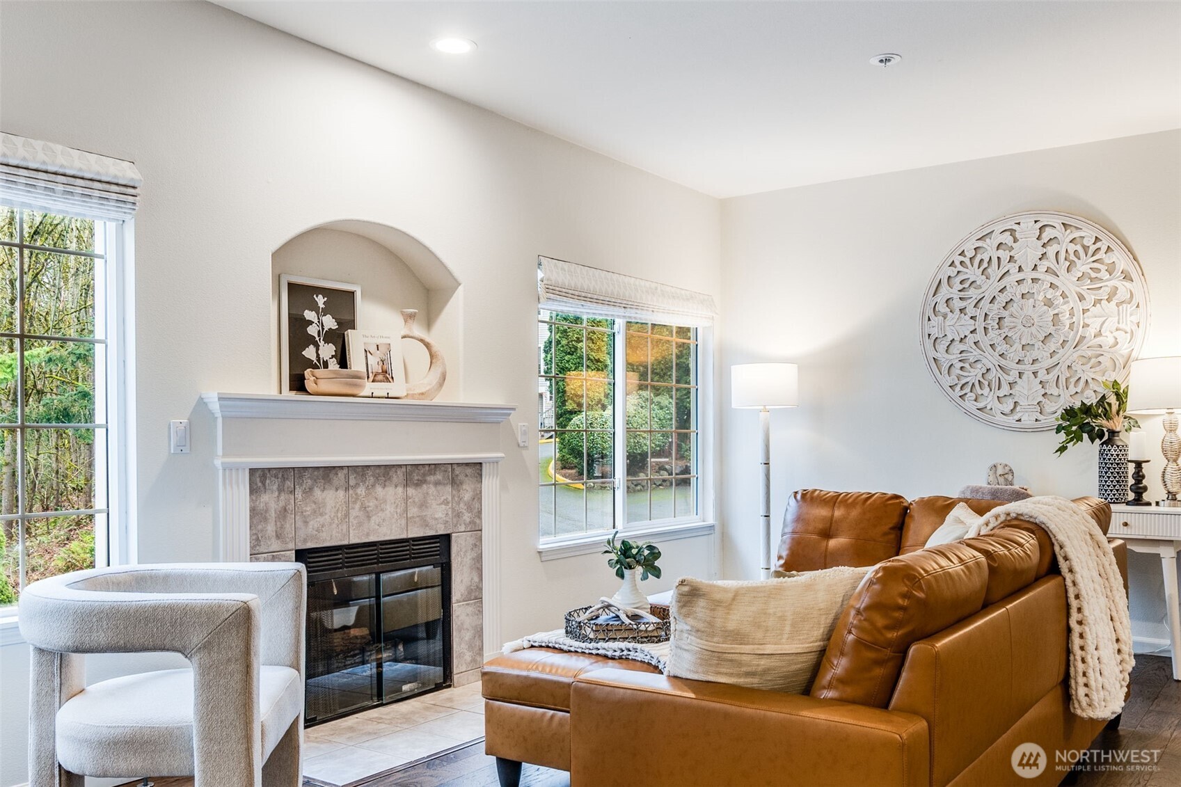 14503 Simonds Road Northeast, Unit C Kirkland, WA 98034 - Photo 4 of 29 a living room with furniture and a fireplace