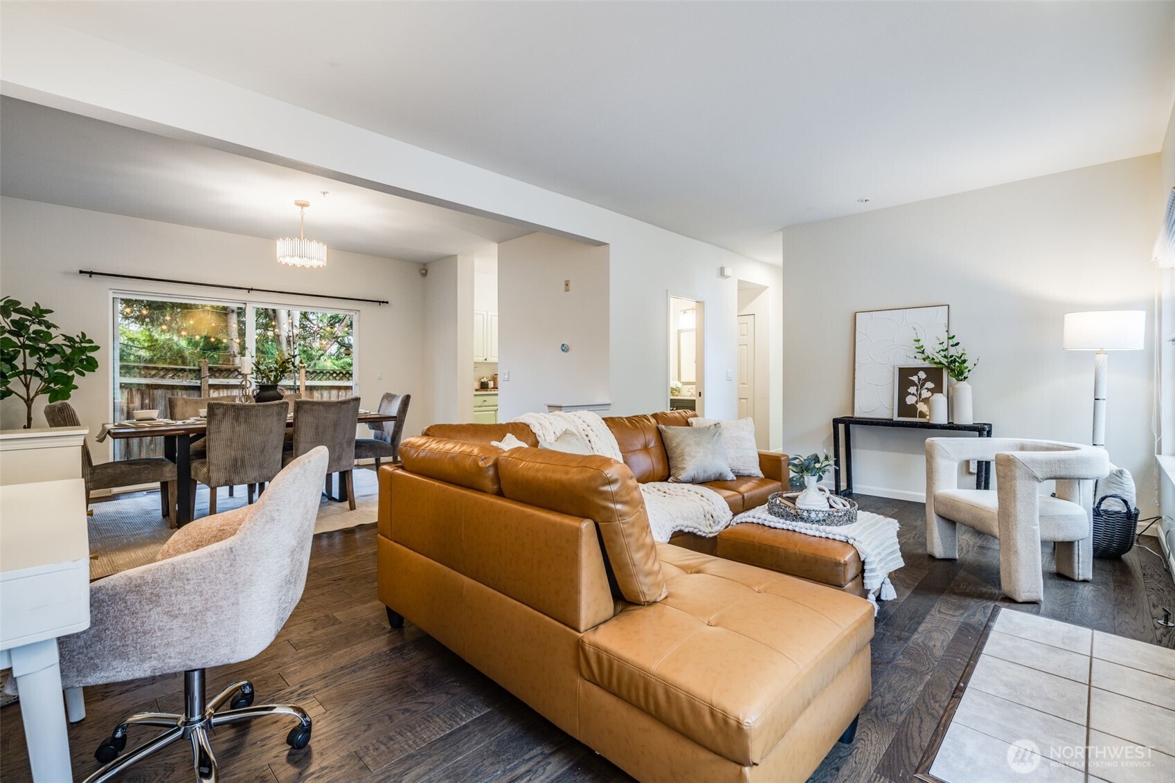 14503 Simonds Road Northeast, Unit C Kirkland, WA 98034 - Photo 6 of 29 a living room with furniture and a large window