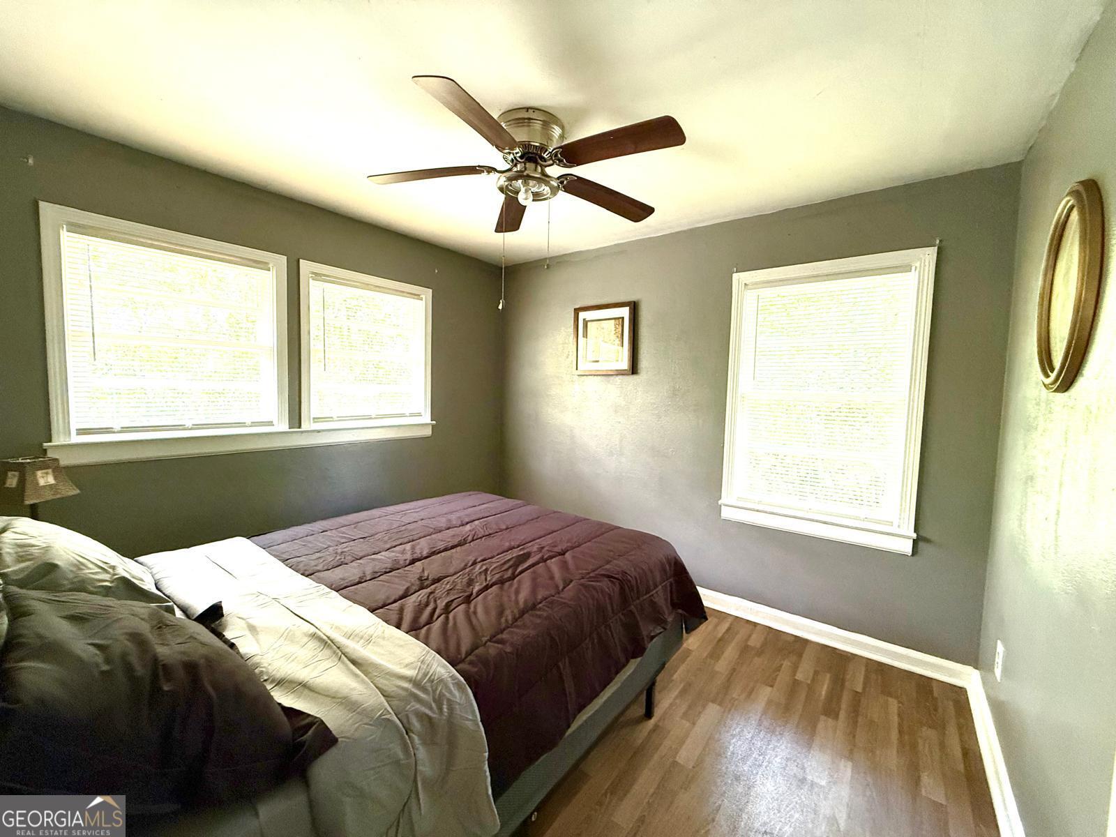 2602 Lake Ridge Circle Rome, GA 30165 - Photo 15 of 19 a bedroom with a bed and window