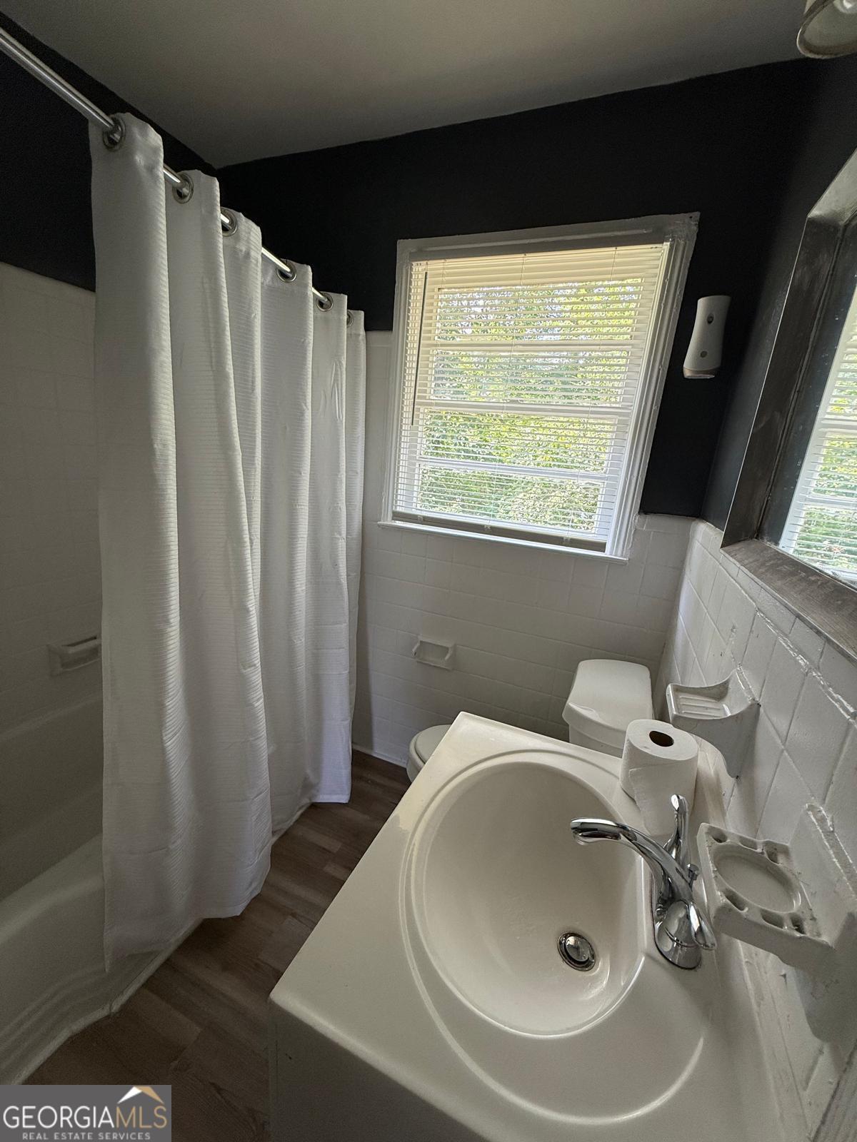 2602 Lake Ridge Circle Rome, GA 30165 - Photo 17 of 19 a bathroom with a sink and a tub