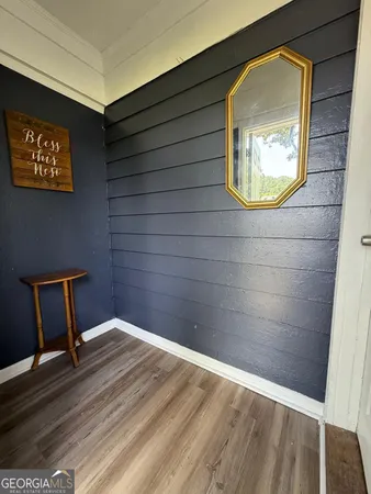 a view of wooden floor in a bathroom