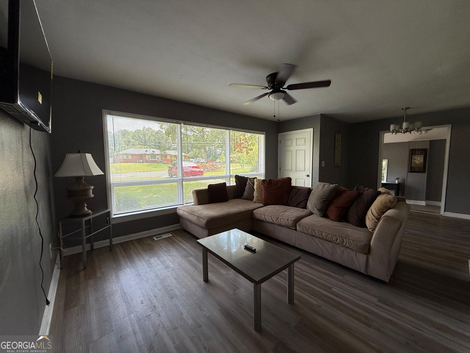 2602 Lake Ridge Circle Rome, GA 30165 - Photo 6 of 19 a living room with furniture and a large window